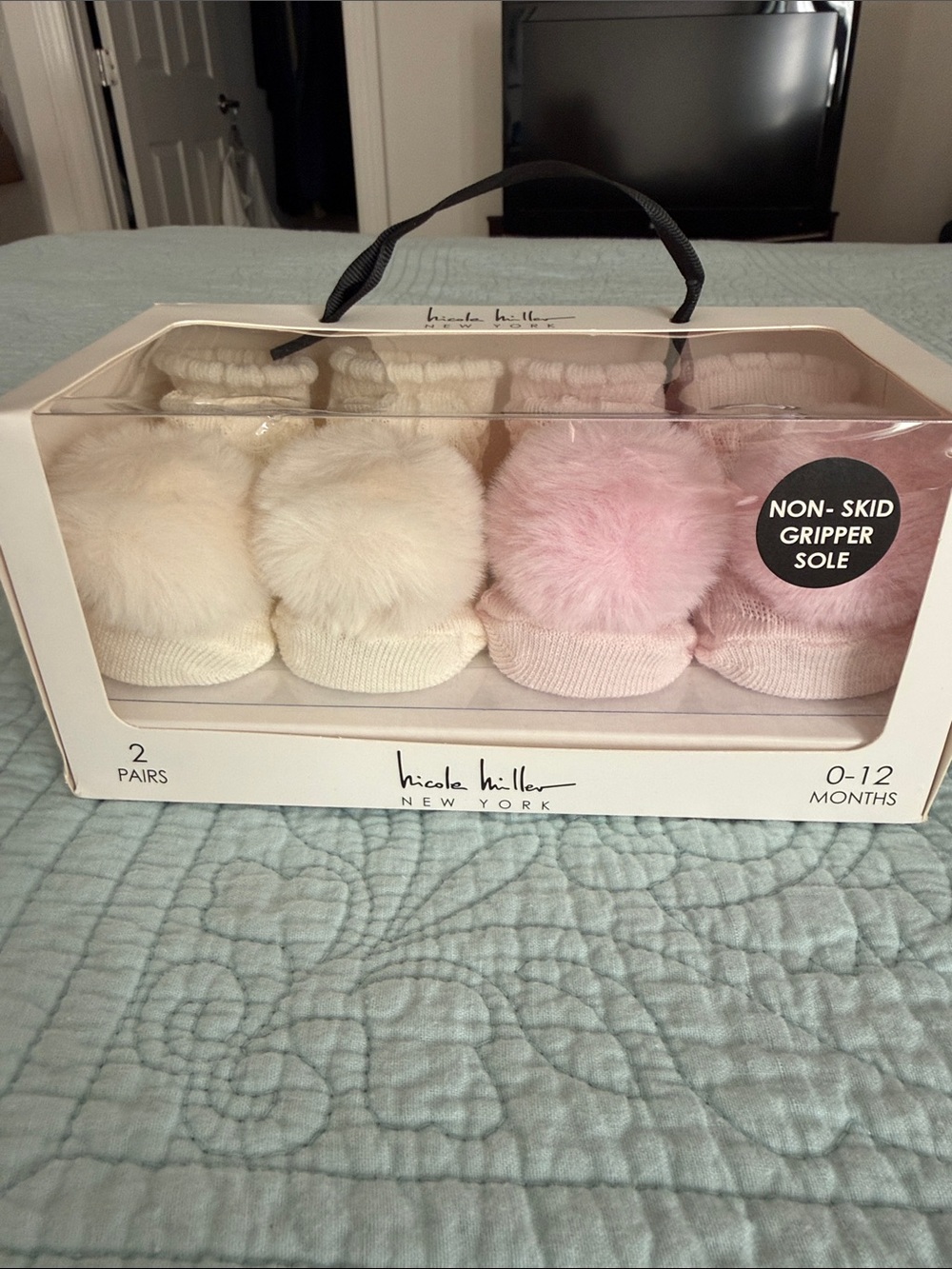 Nicole Miller Baby Pom Pom Booties in Cream and Light Pink